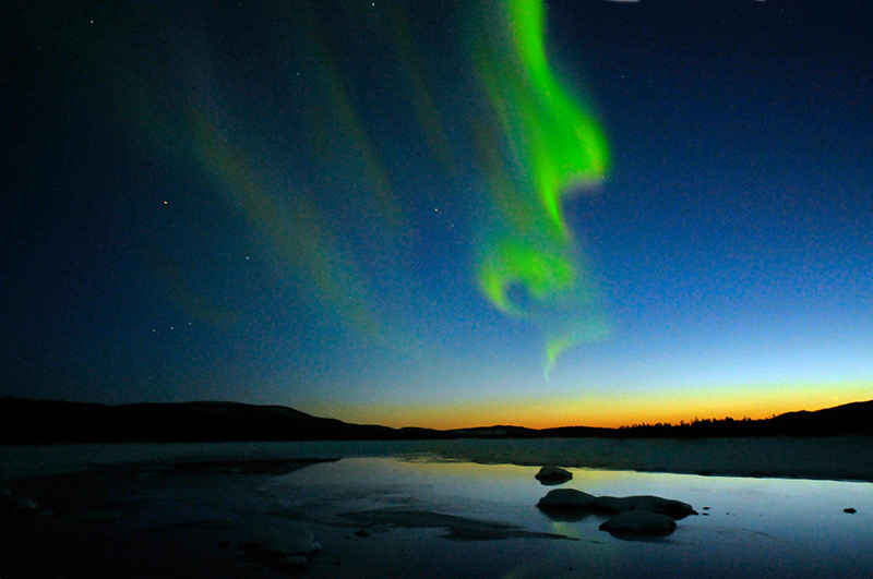 Northern lights over Malmesjaur, Moskosel, Lapland, Sweden