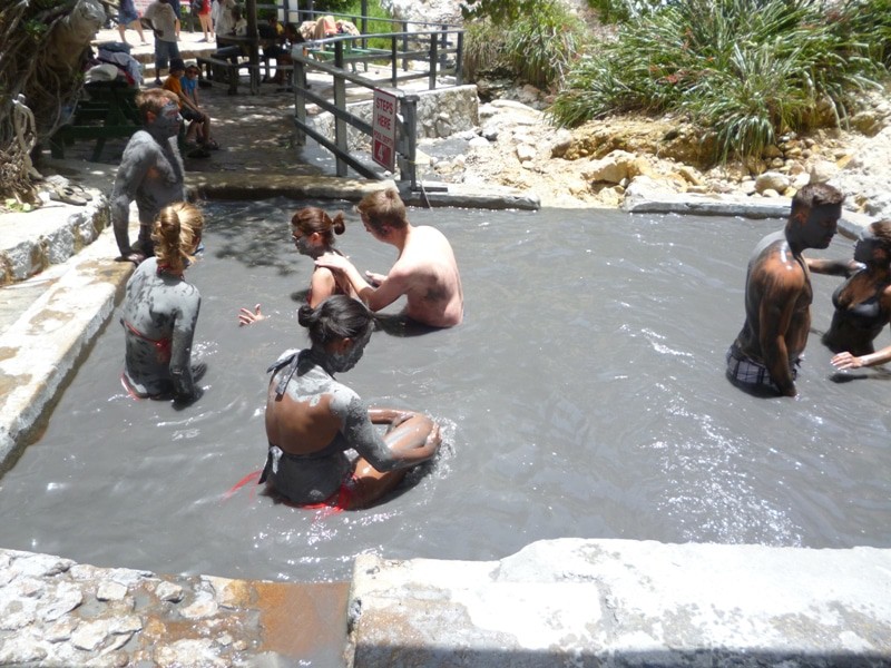 Bathe in the nearby mud pools