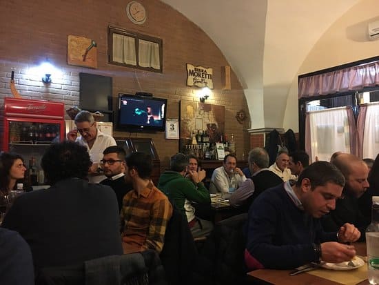 Enjoy a traditional meal at the Osteria Numero Dieci