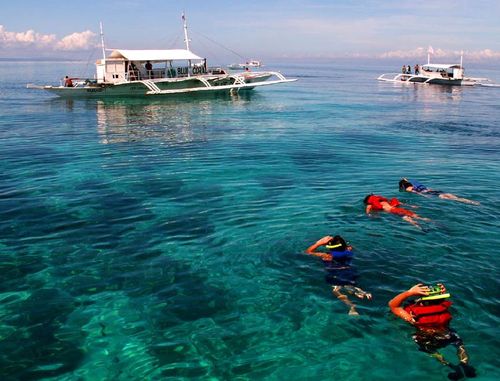 Hire a local Boat for Snorkeling